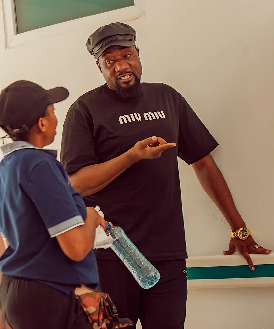 Director talking through a scene with crew